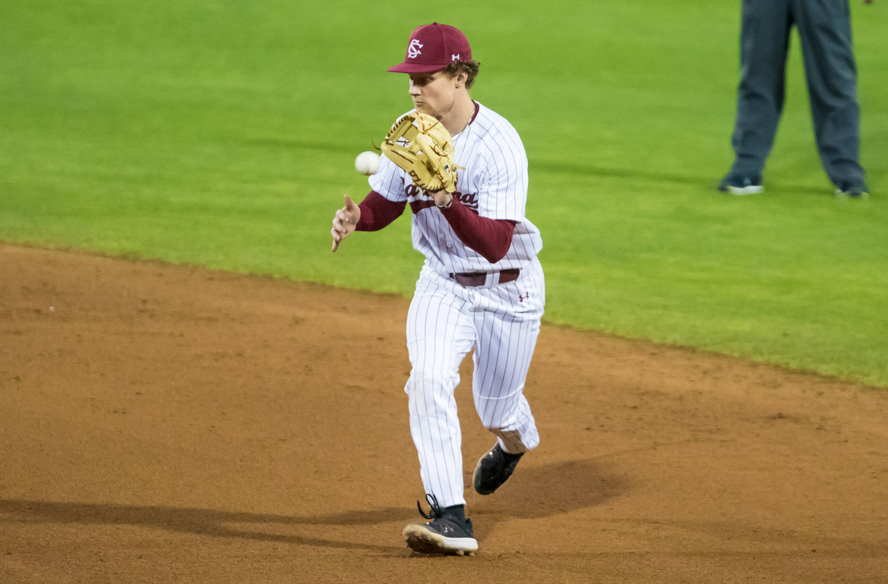 South Carolina Gamecocks infielder Jeff Heinrich (8) fields a hopper against the Dayton Flyers.

South Carolina vs. Dayton Baseball, Feb. 19, 2021, Founders Park, Columbia, SC.

Photo by Jeff Blake